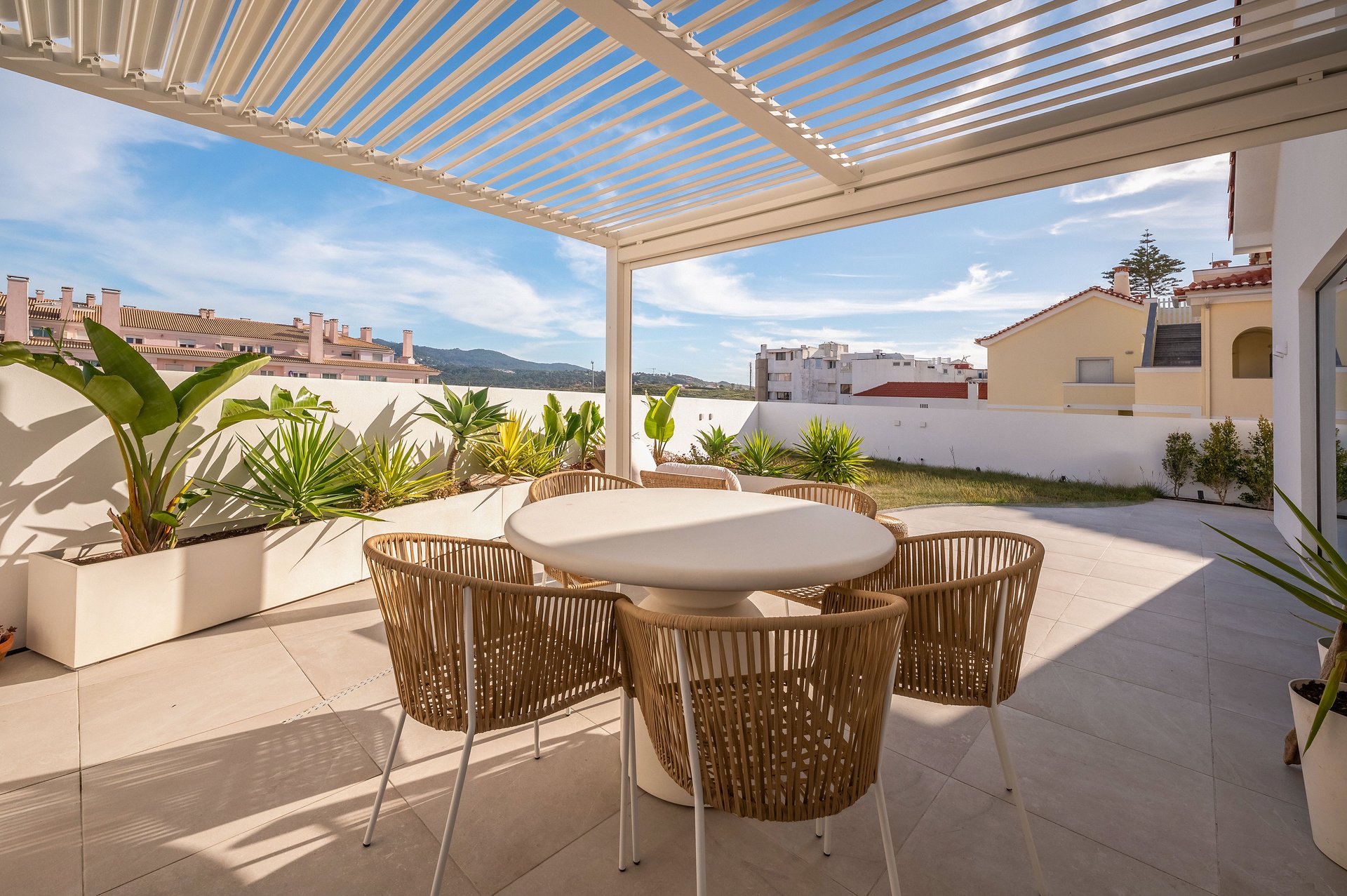 Outdoor terrace dining area at Villa Flora