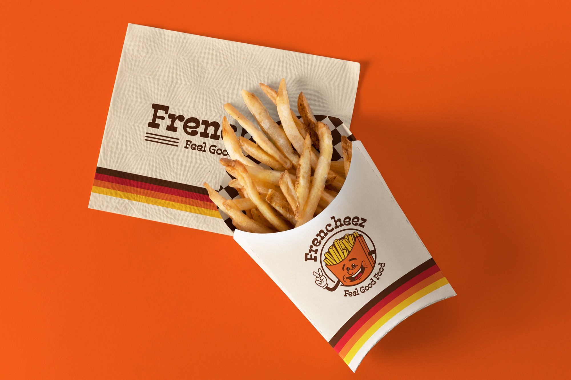 Frencheez branded fries box and napkin with real fries