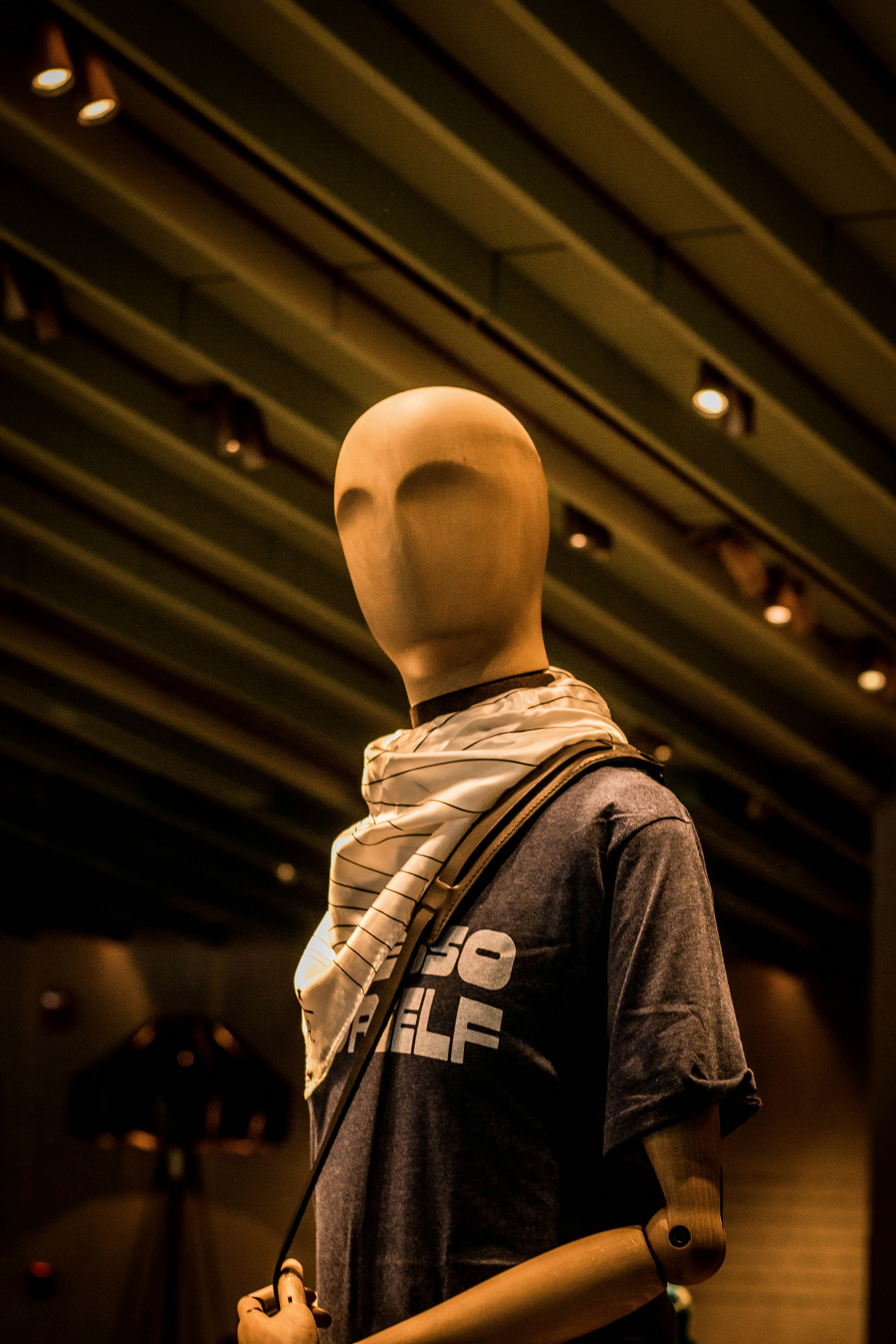 man in black and yellow crew neck shirt