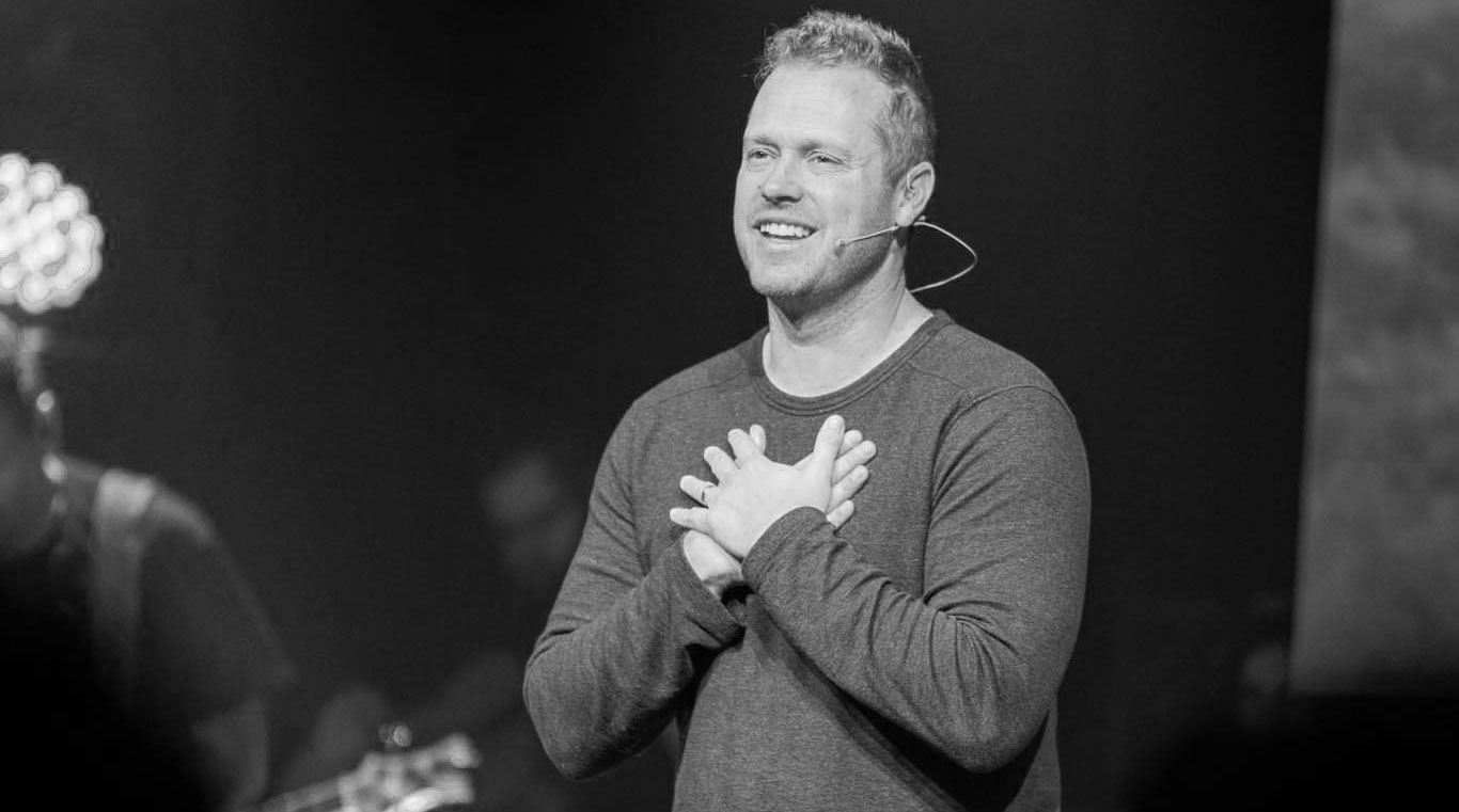 a building with trees and plants