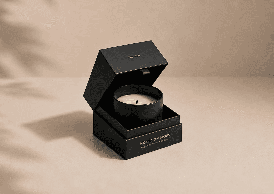 Black candle in a black gift box