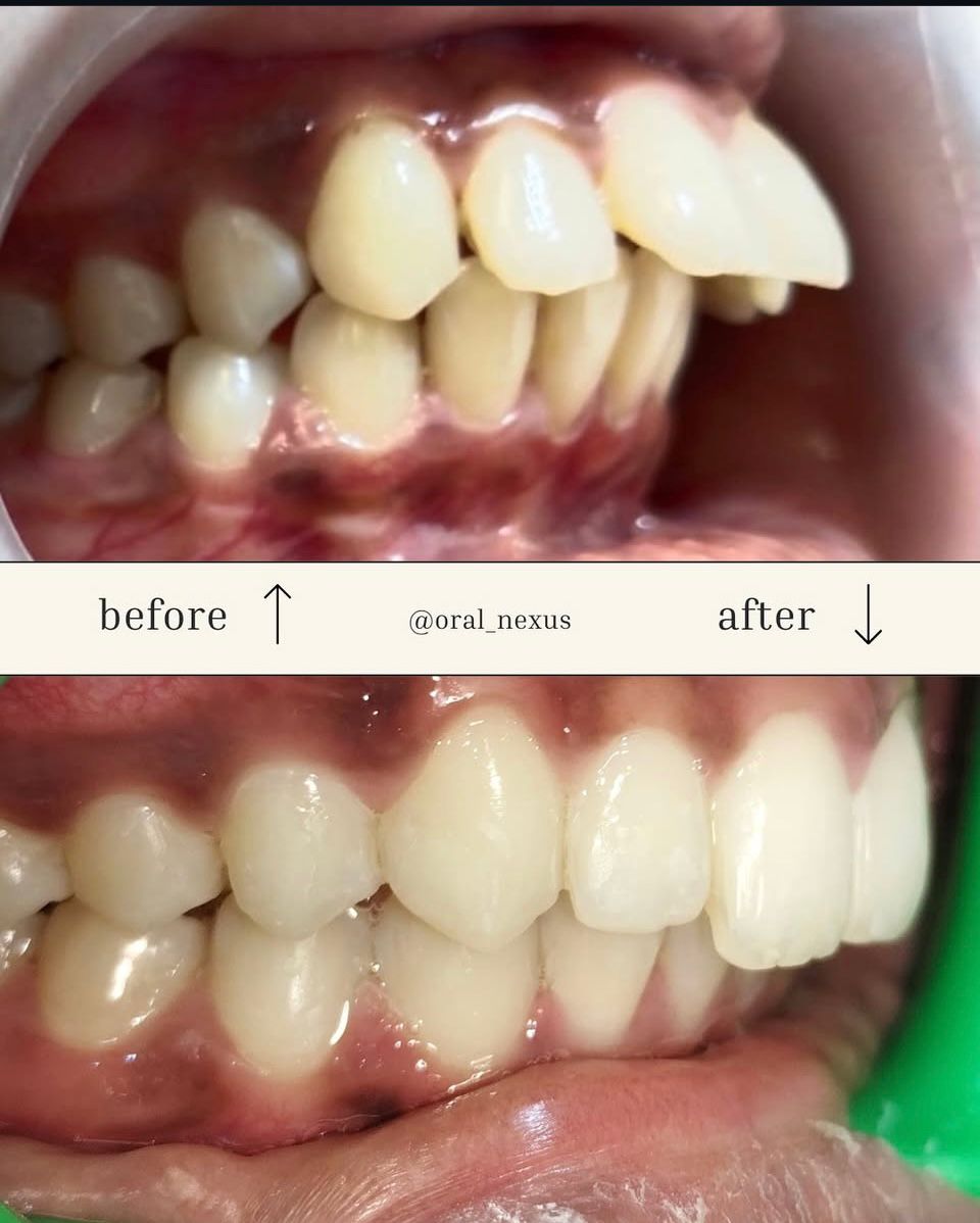 Doctor in white coat holding stethoscope near window with vertical blinds, light hair pulled back.