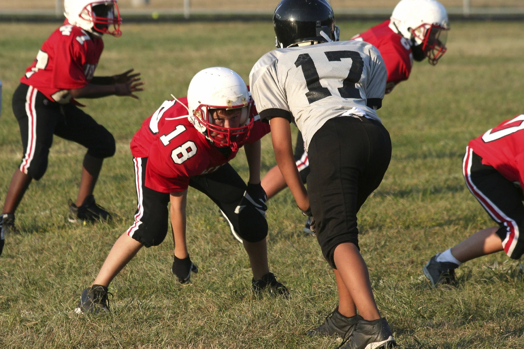 Boy during warm-up learning coping skills for anxiety in athletes