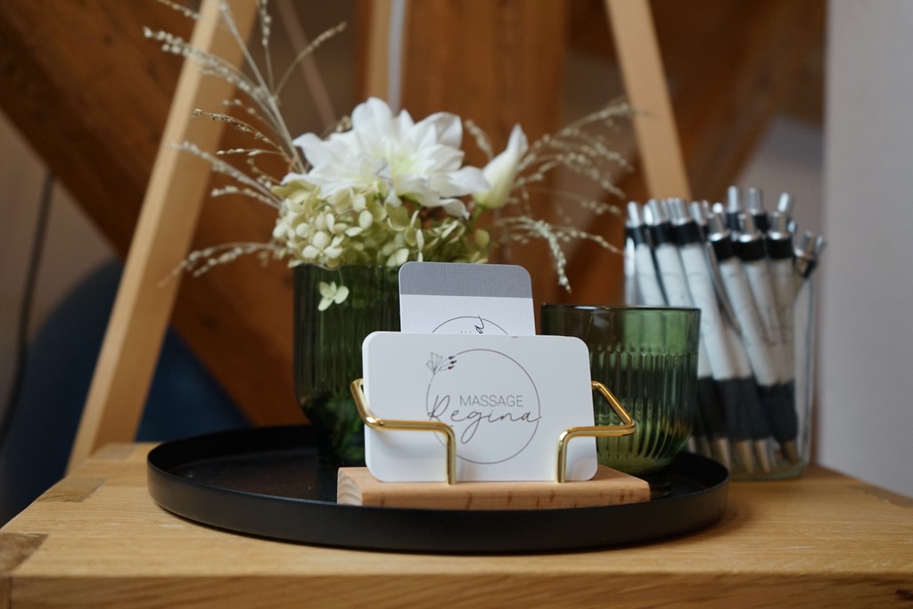 Mirror with lit candles on a counter