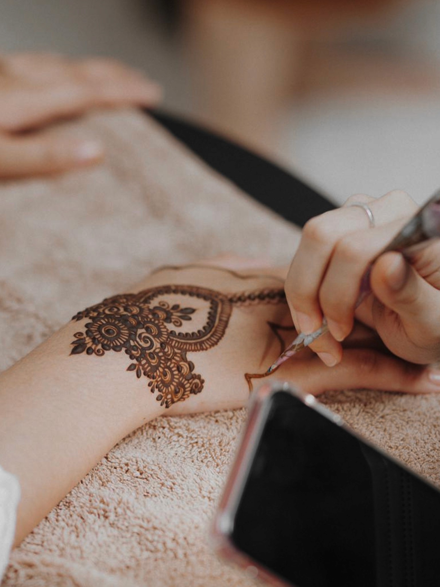 Close-up of henna created at an event. 