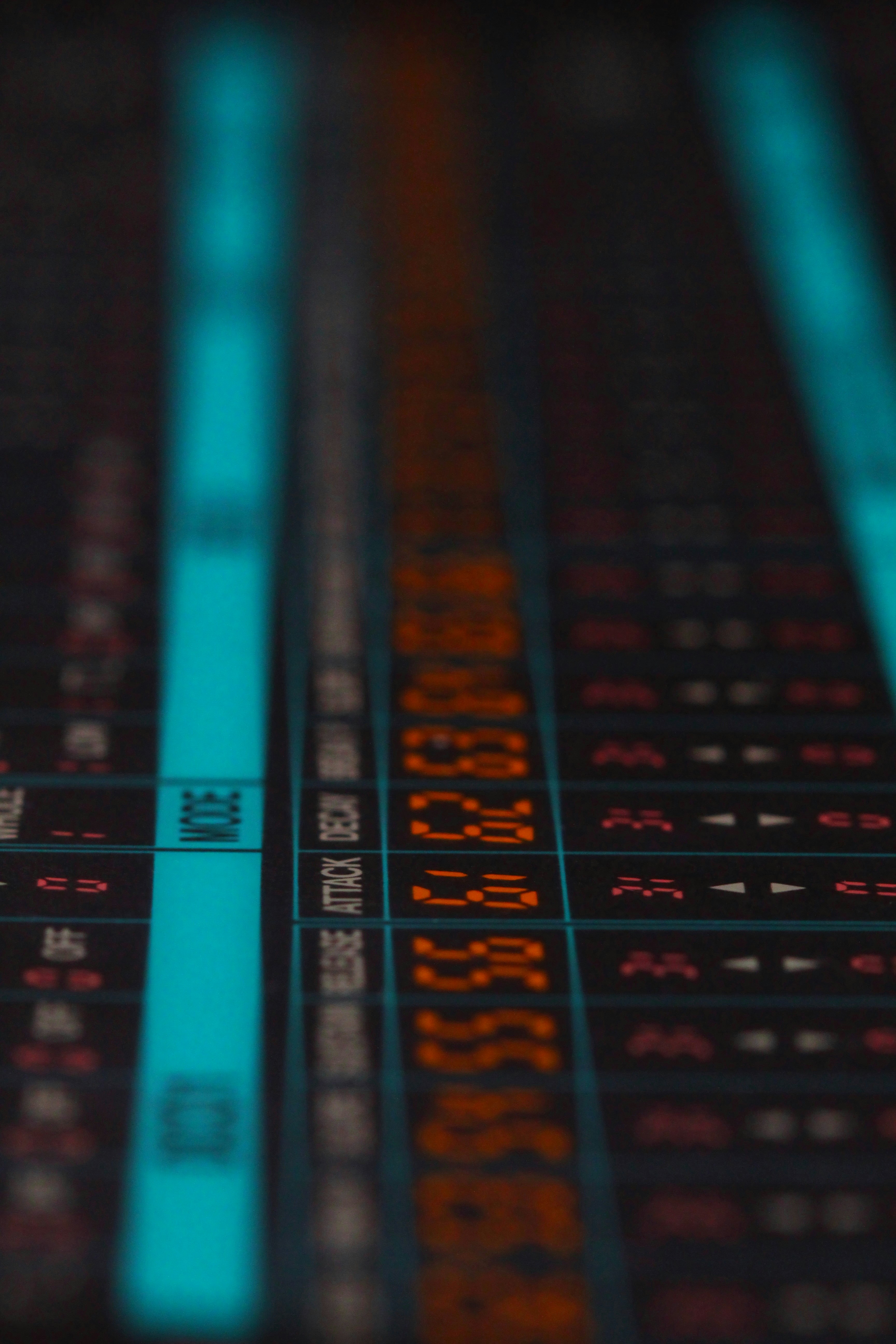Aerial view of a winding road surrounded by dense green and yellow trees, showcasing nature’s vibrant colors.
