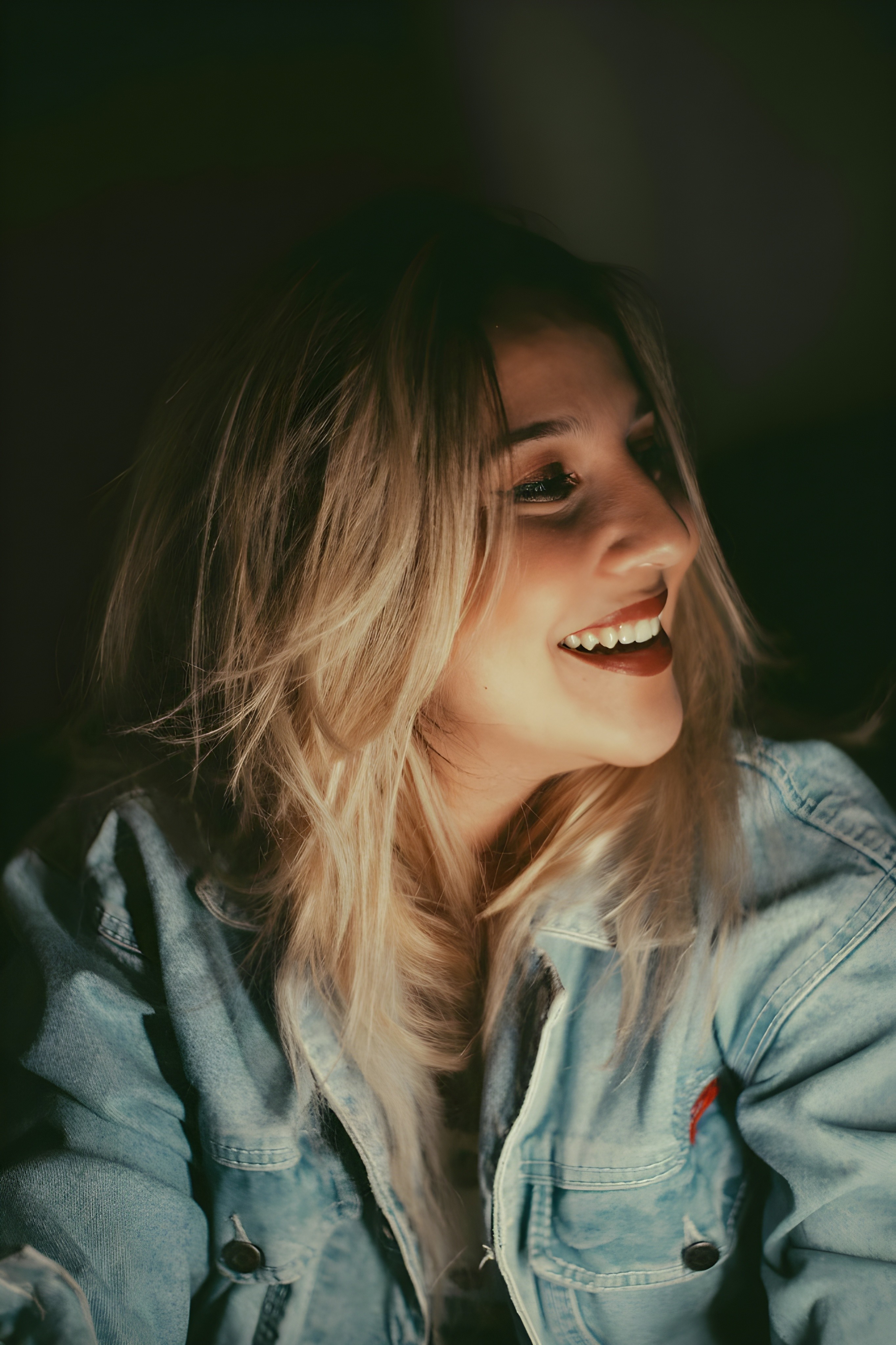 woamn smiling sideways