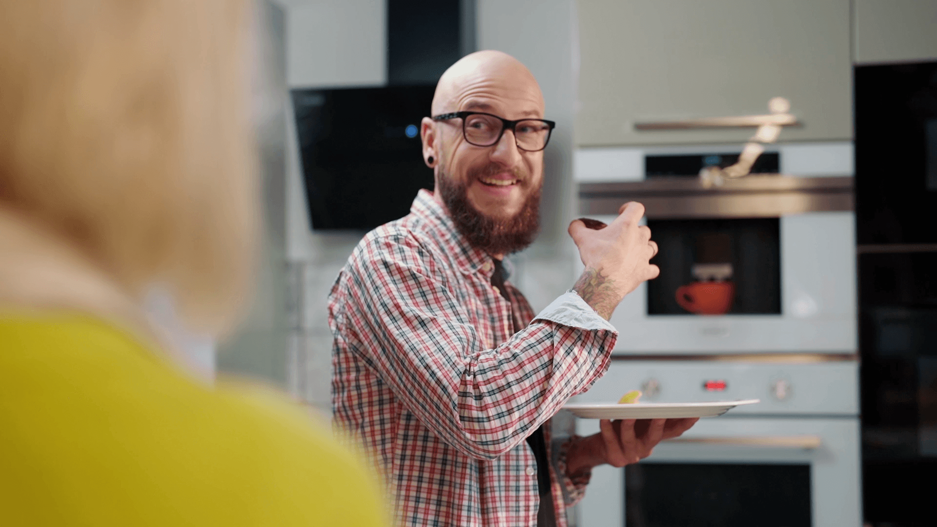 Man against a backdrop of household appliances