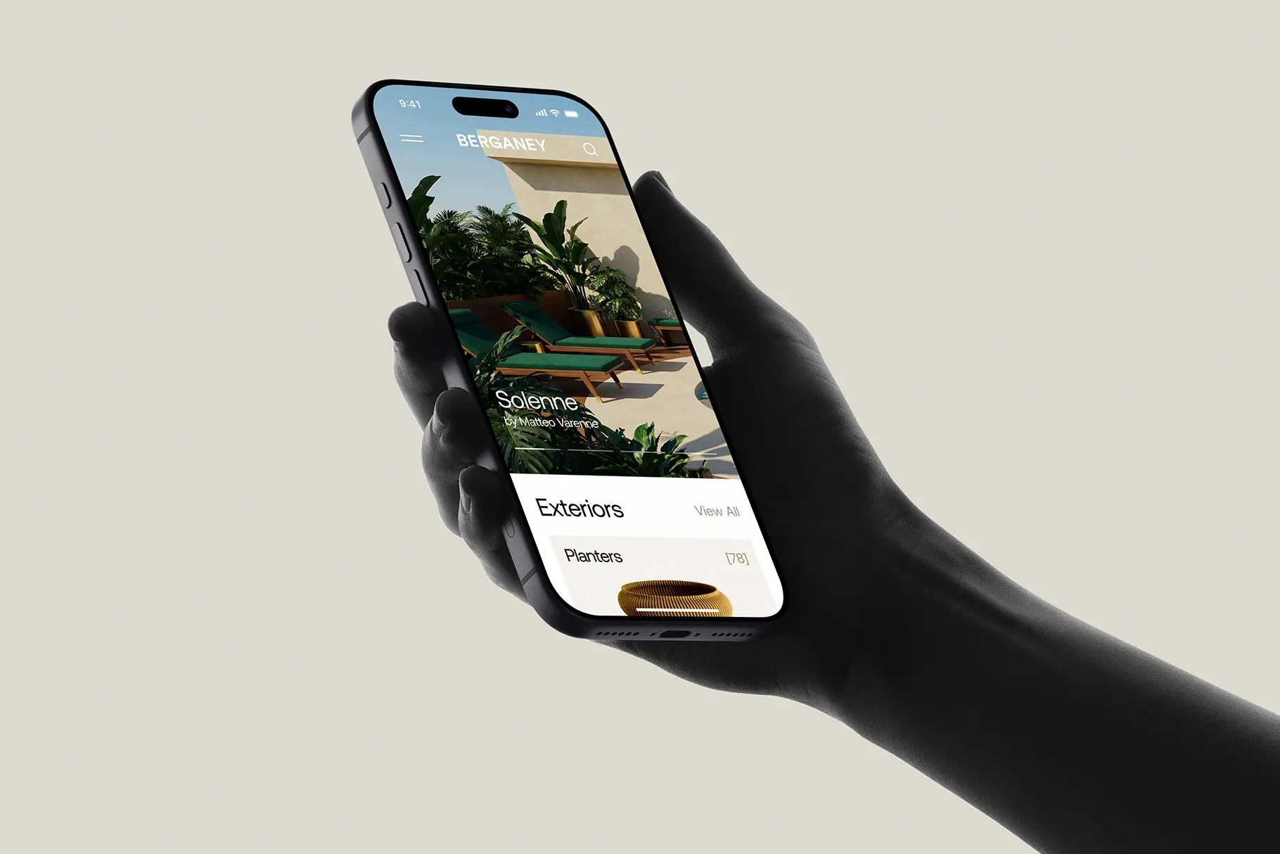 Dark hand-held smartphone mockup featuring a furniture app design with realistic lighting and depth.