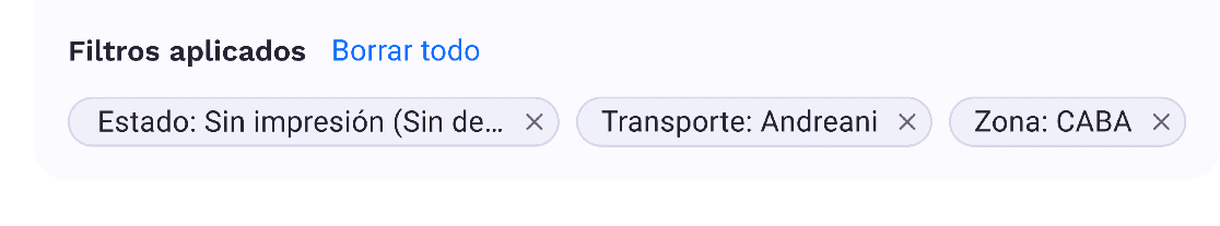 Close-up of two smiling friends with freckles, bright makeup, on a light blue background—joyful, inclusive brand portrait.