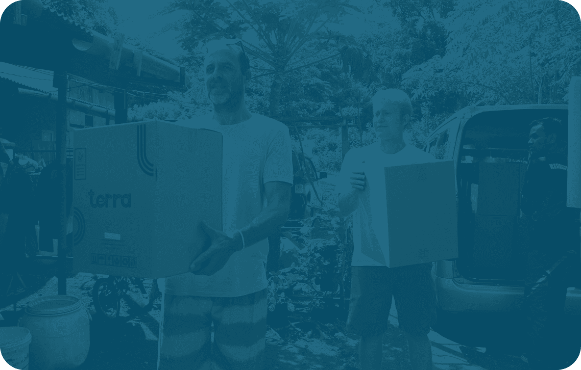 Volunteers carrying boxes of supplies during a community aid delivery