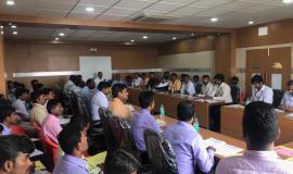 person using phone and laptop computer