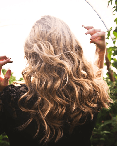 woman running wearing armband