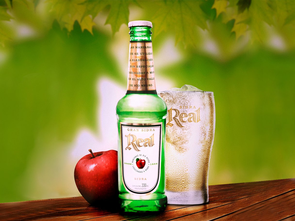 Rooftops of a coastal town with the sea in background