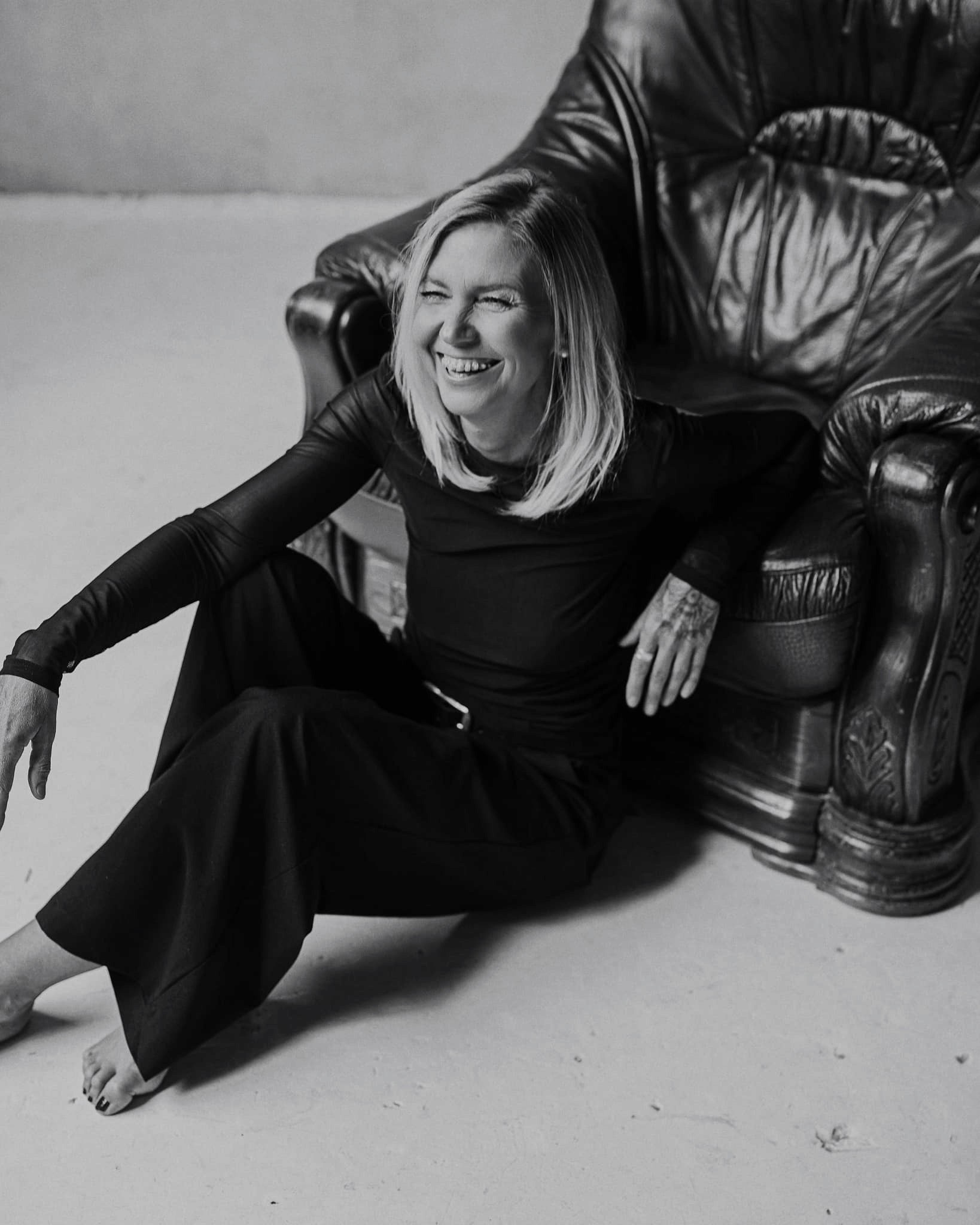 a blurry photo of a person standing in front of a wall