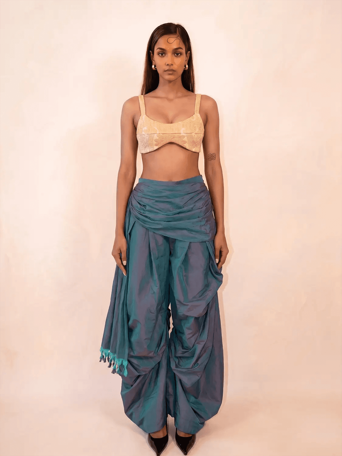 Antariya is a one of a kind drape pant, handcrafted in house from repurposed pure silk and saree borders. 