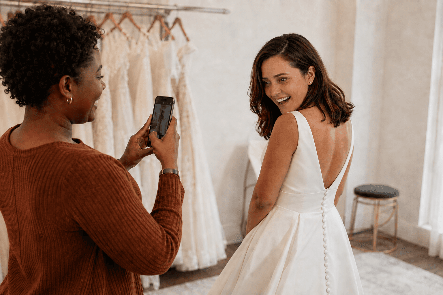 The same woman with clearer skin smiles at her dress fitting in a dramatized later scene