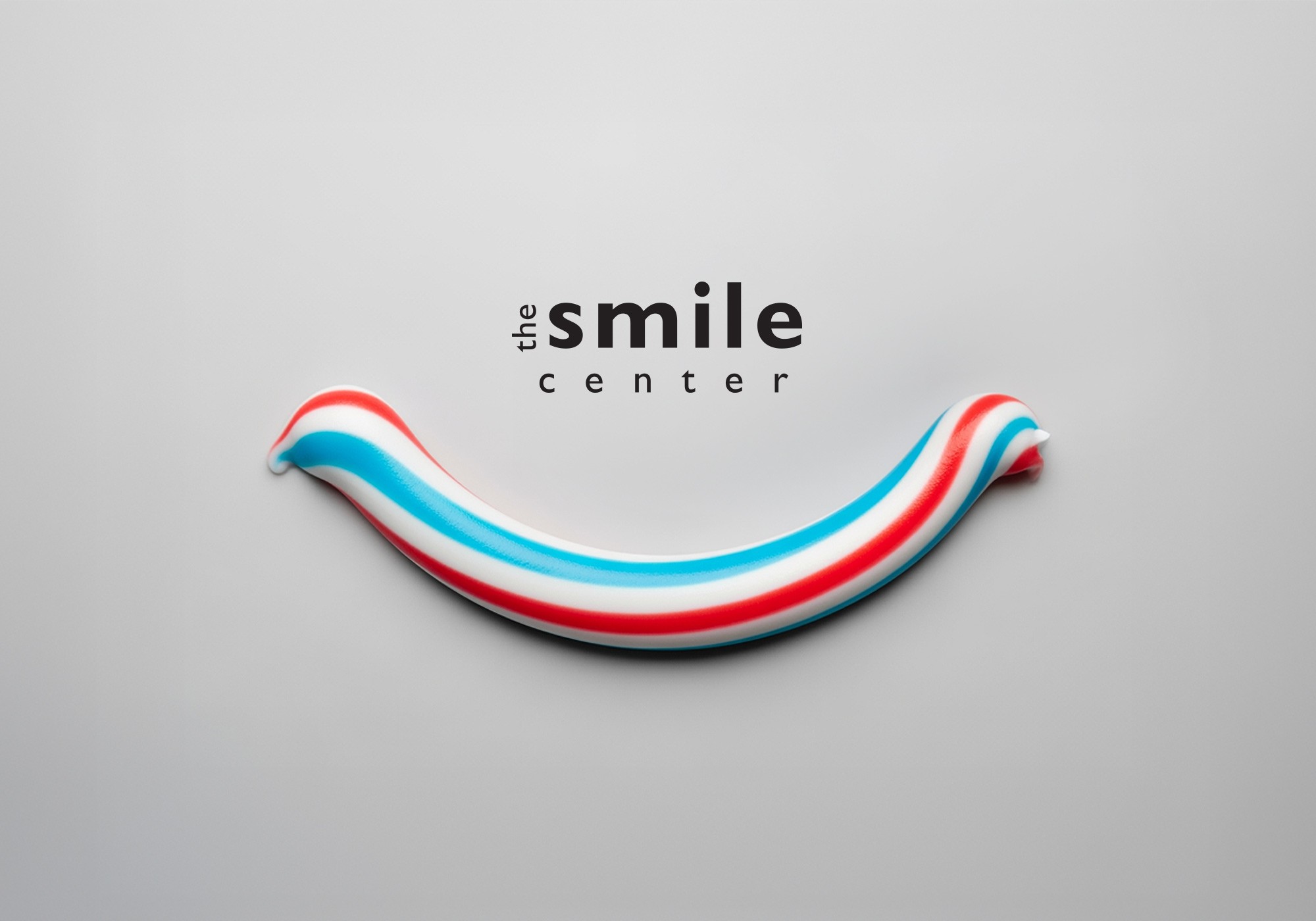 Toothpaste smooth curved line that resembles a smile