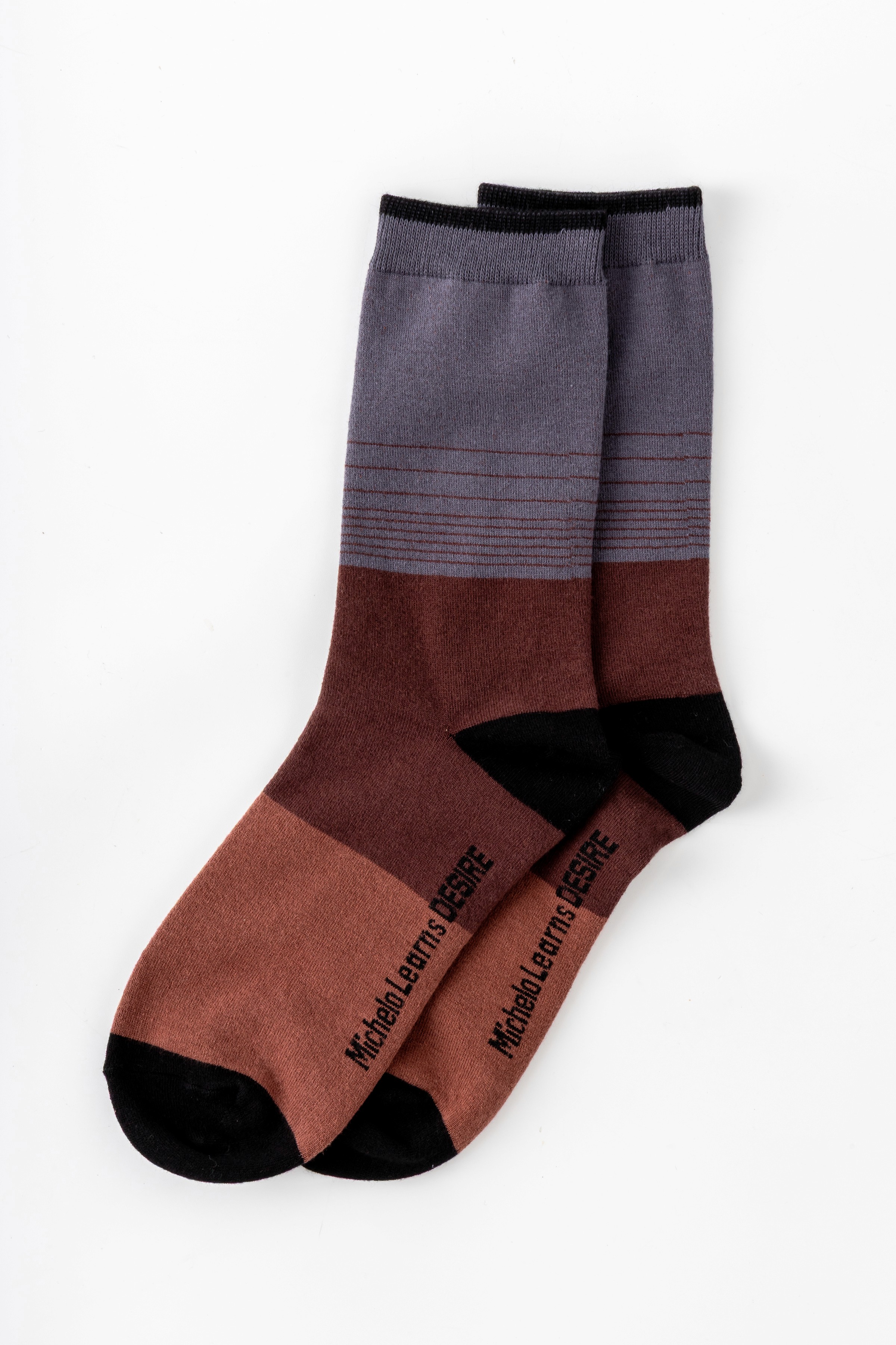 golden sneakers on the desert