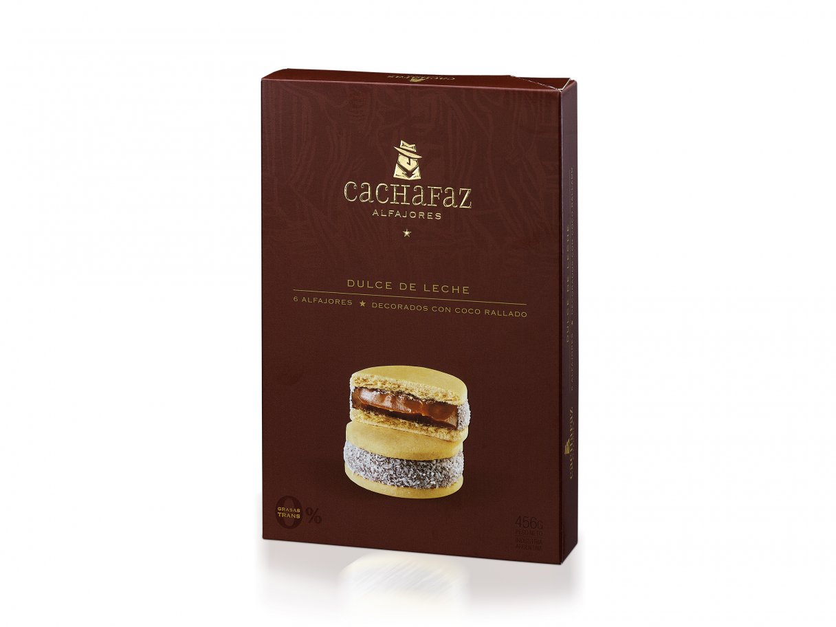 Rooftops of a coastal town with the sea in background