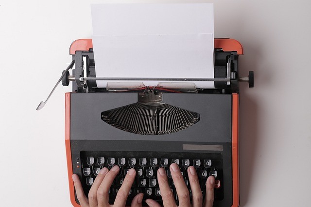 black Fayorit typewriter with printer paper