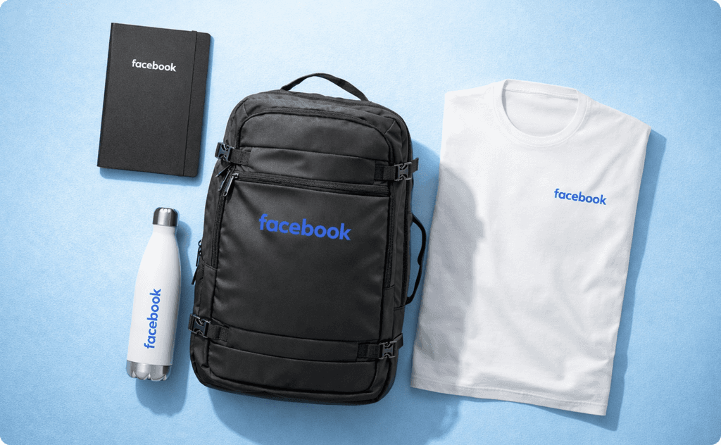Inside Facebook/Meta's new hire swag kit: notebook, tumbler, bag, and t-shirt.