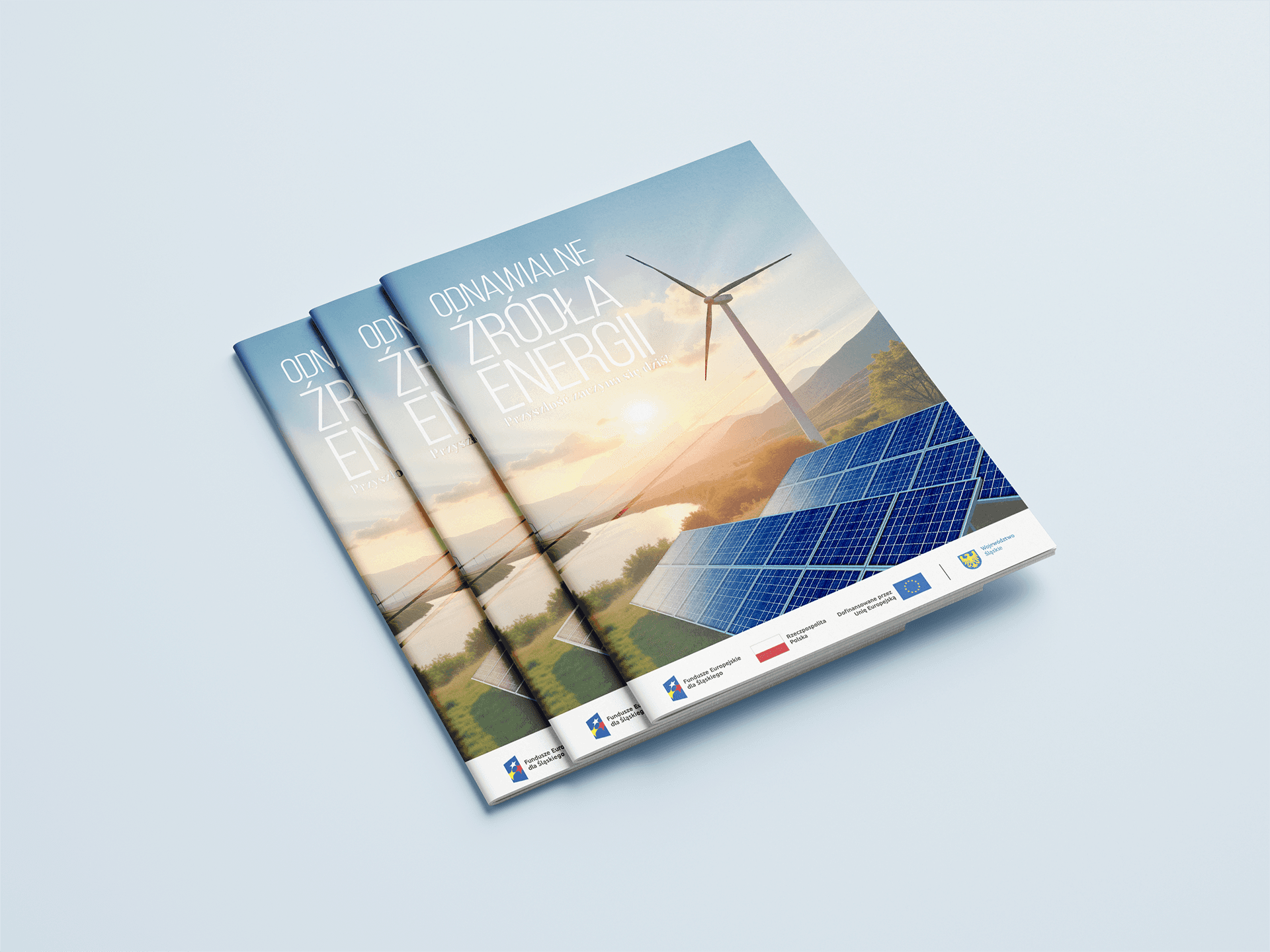 Broszura Odnawialne Źródła Energii leżąca na jednolitym tle