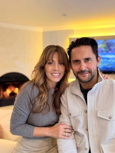 man in suit with laptop