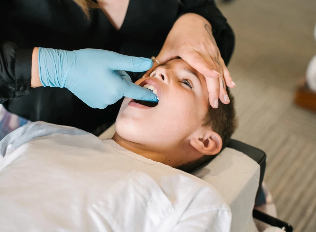 Teenager getting chiropractic adjustment