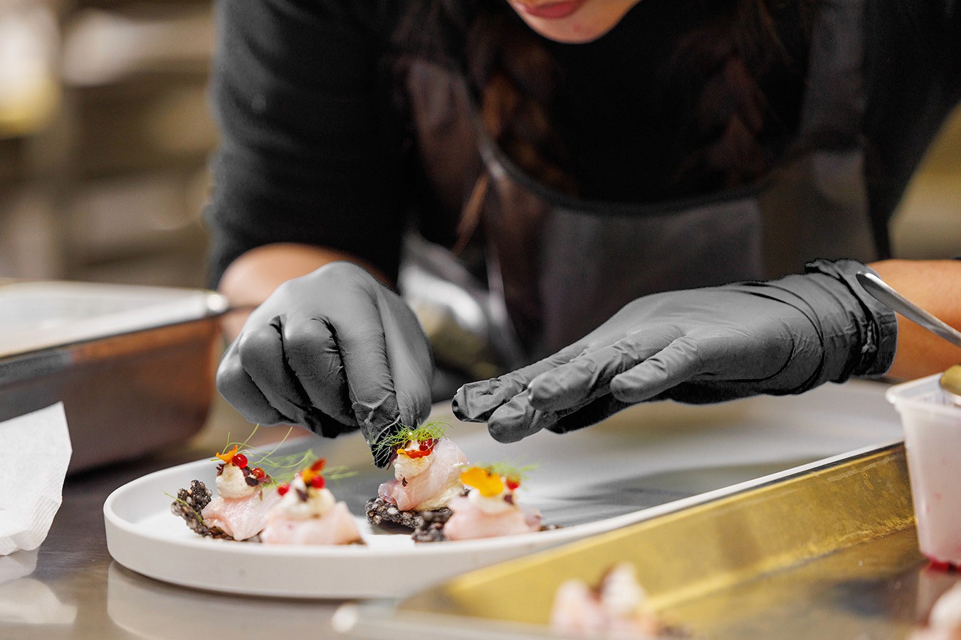 Chef preparing canapes in a kitchen