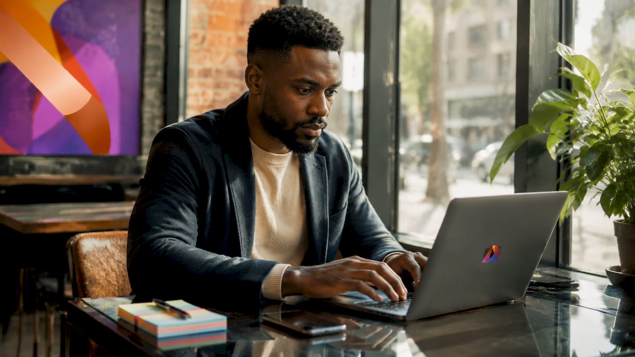 Financial analyst working with AI-driven investment laptop