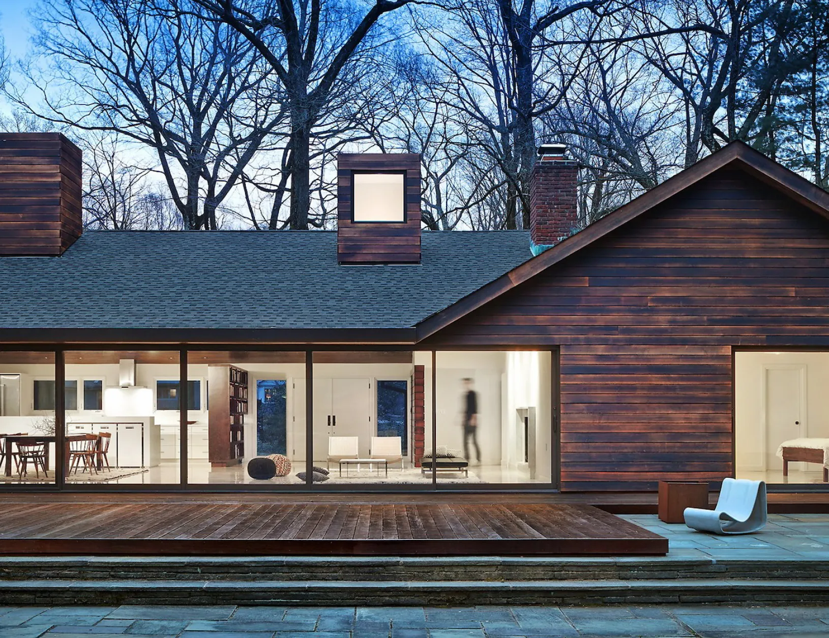 Japanese burnt wood facade material with glazed back openings to pool area