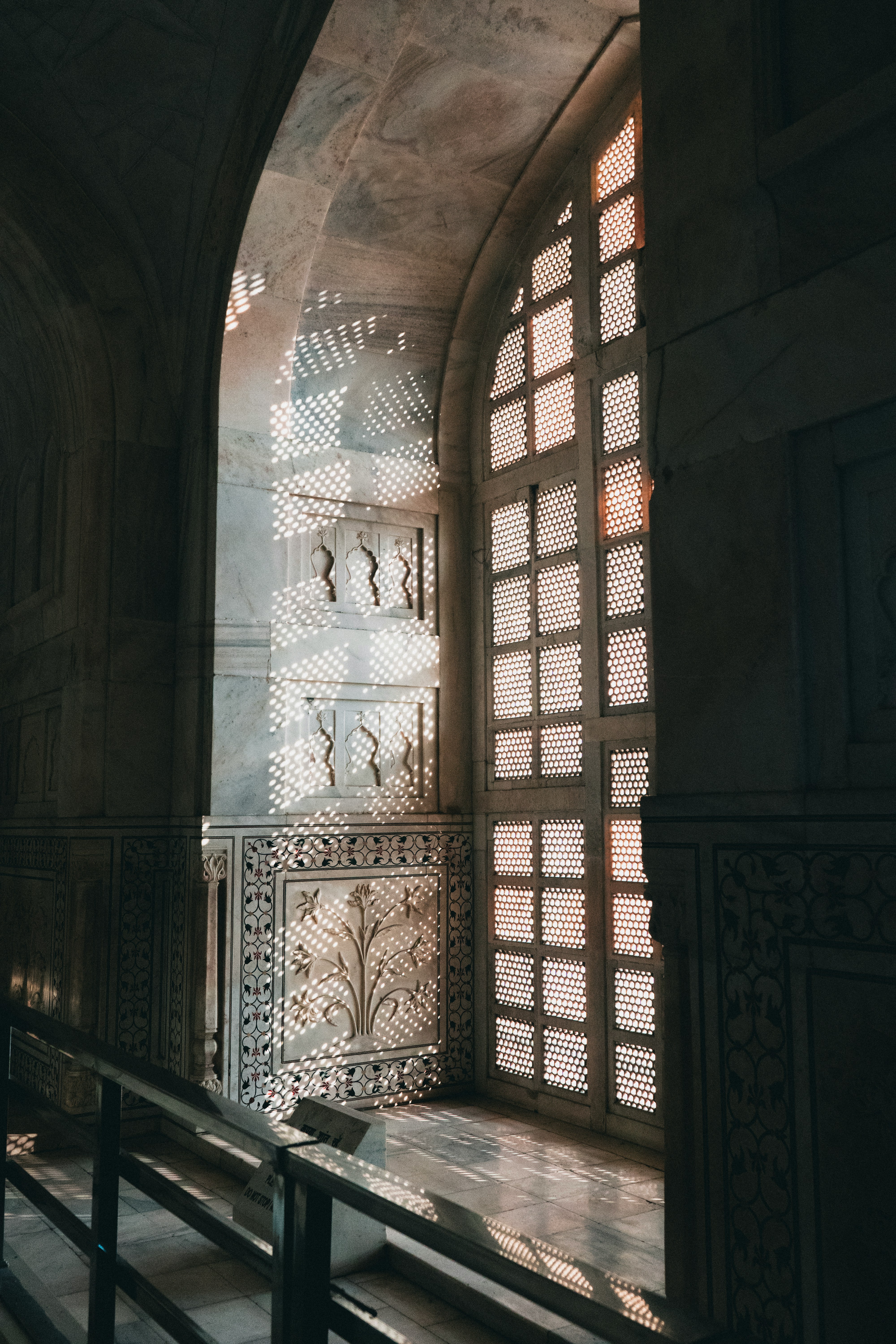 A window in a building with a railing