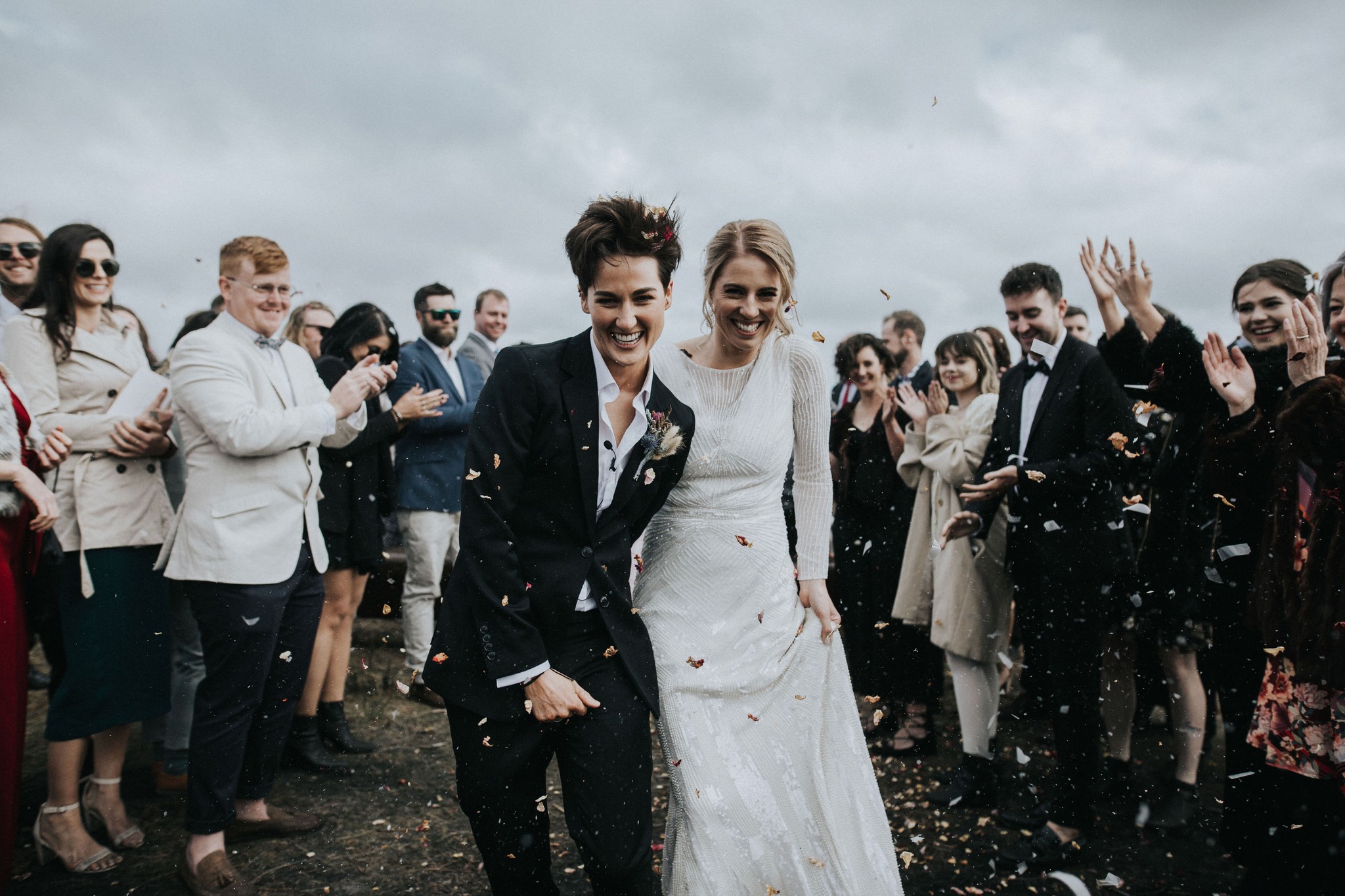 Couple in Womens Wedding Suit and Dress