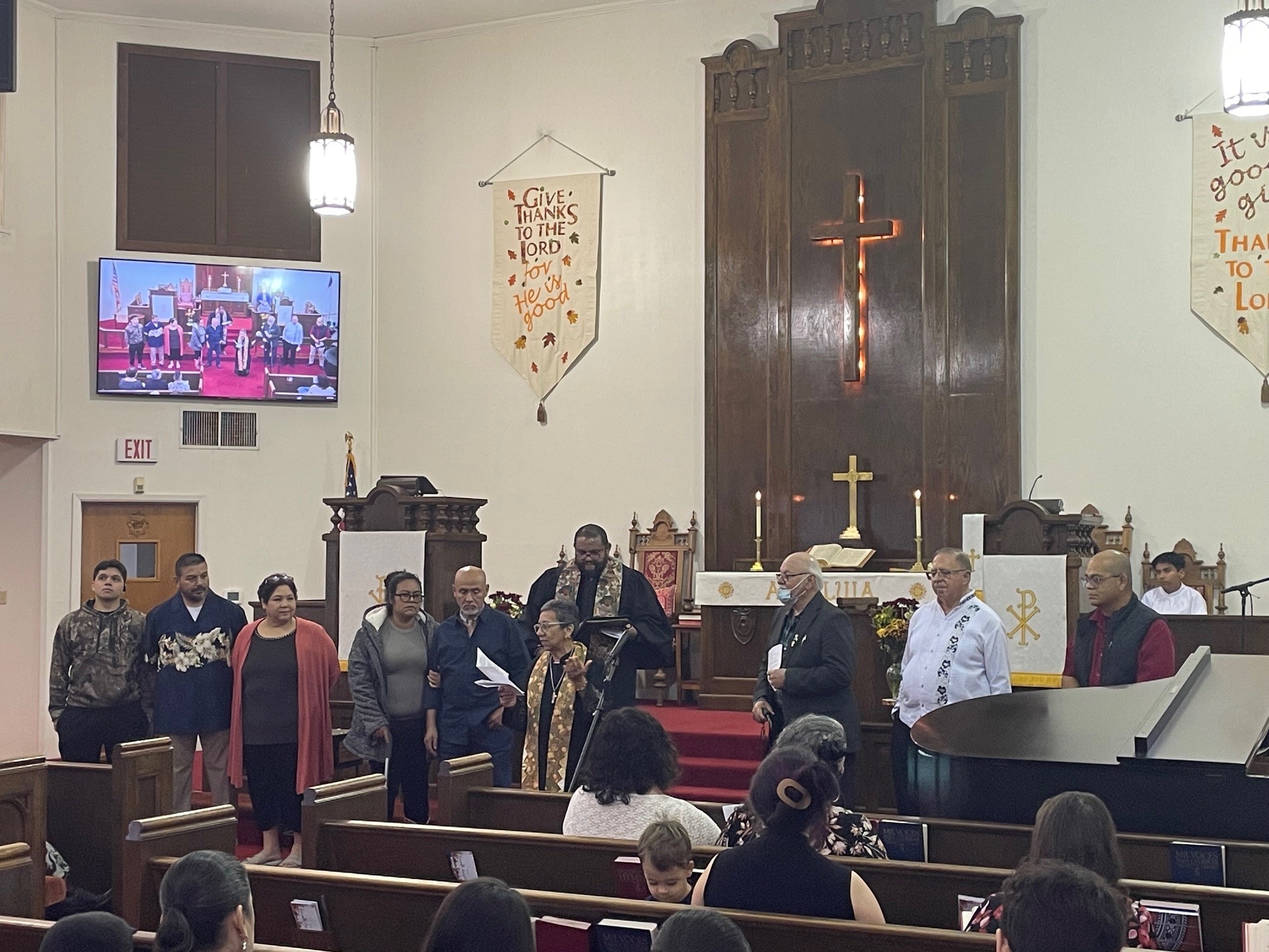 people gathering in La Trinidad sanctuary