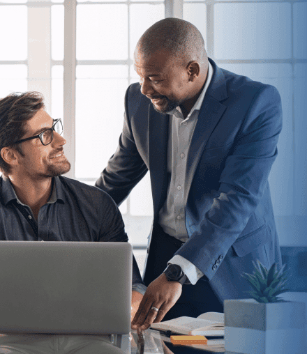 man drawing on dry-erase board