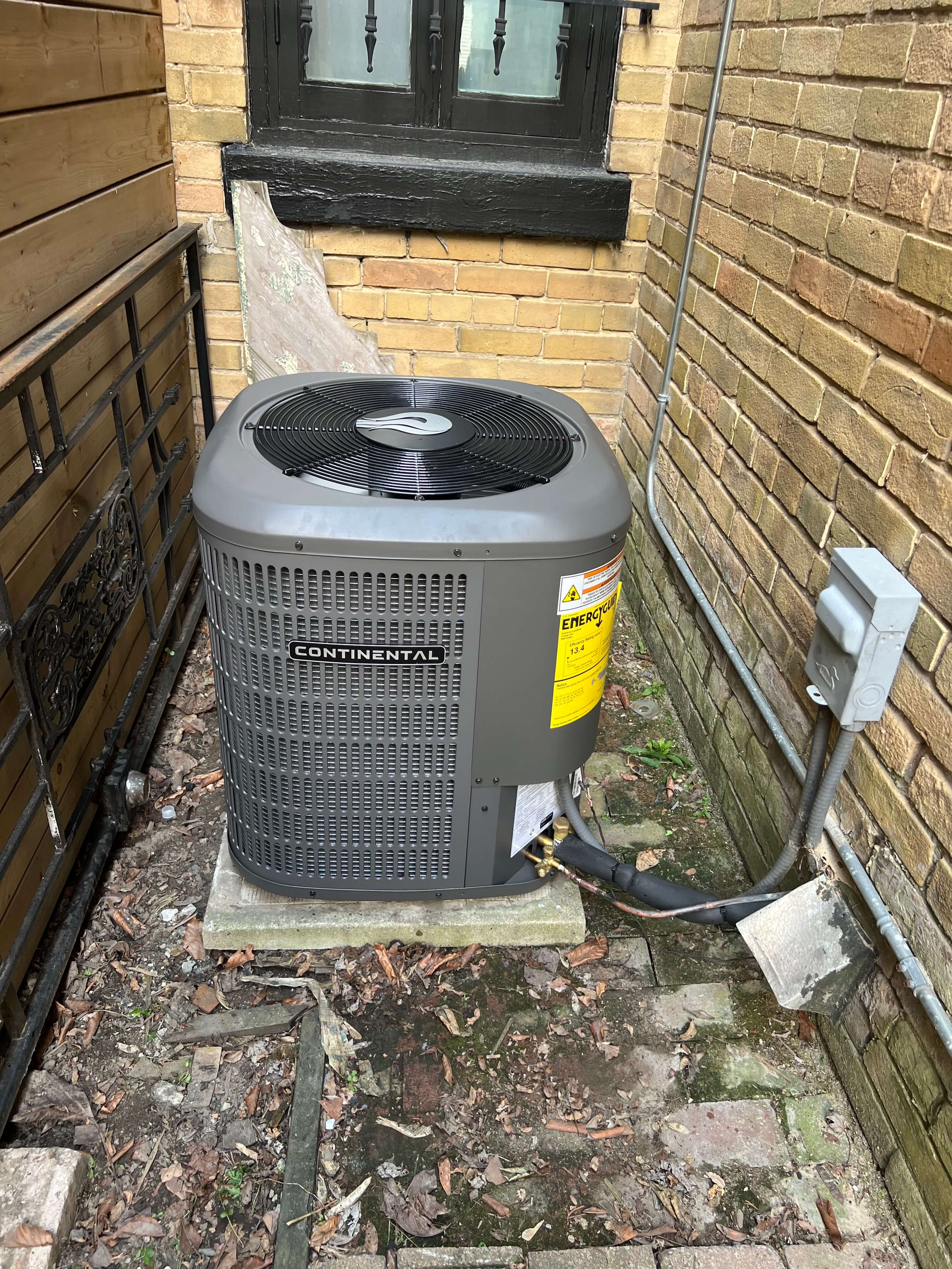 Air conditioner installed in Mississauga home backyard