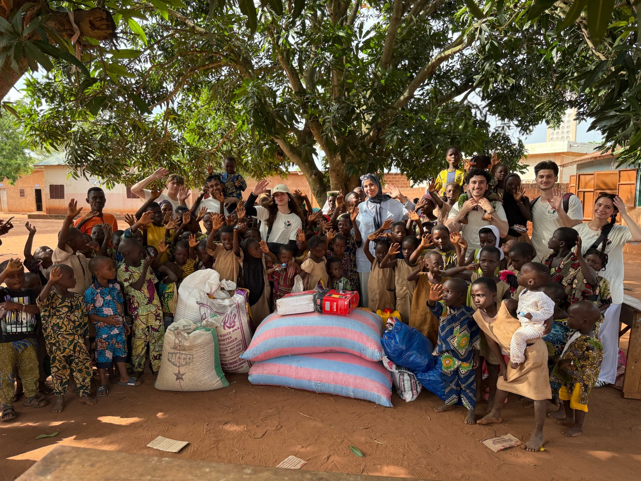 man drawing on dry-erase board