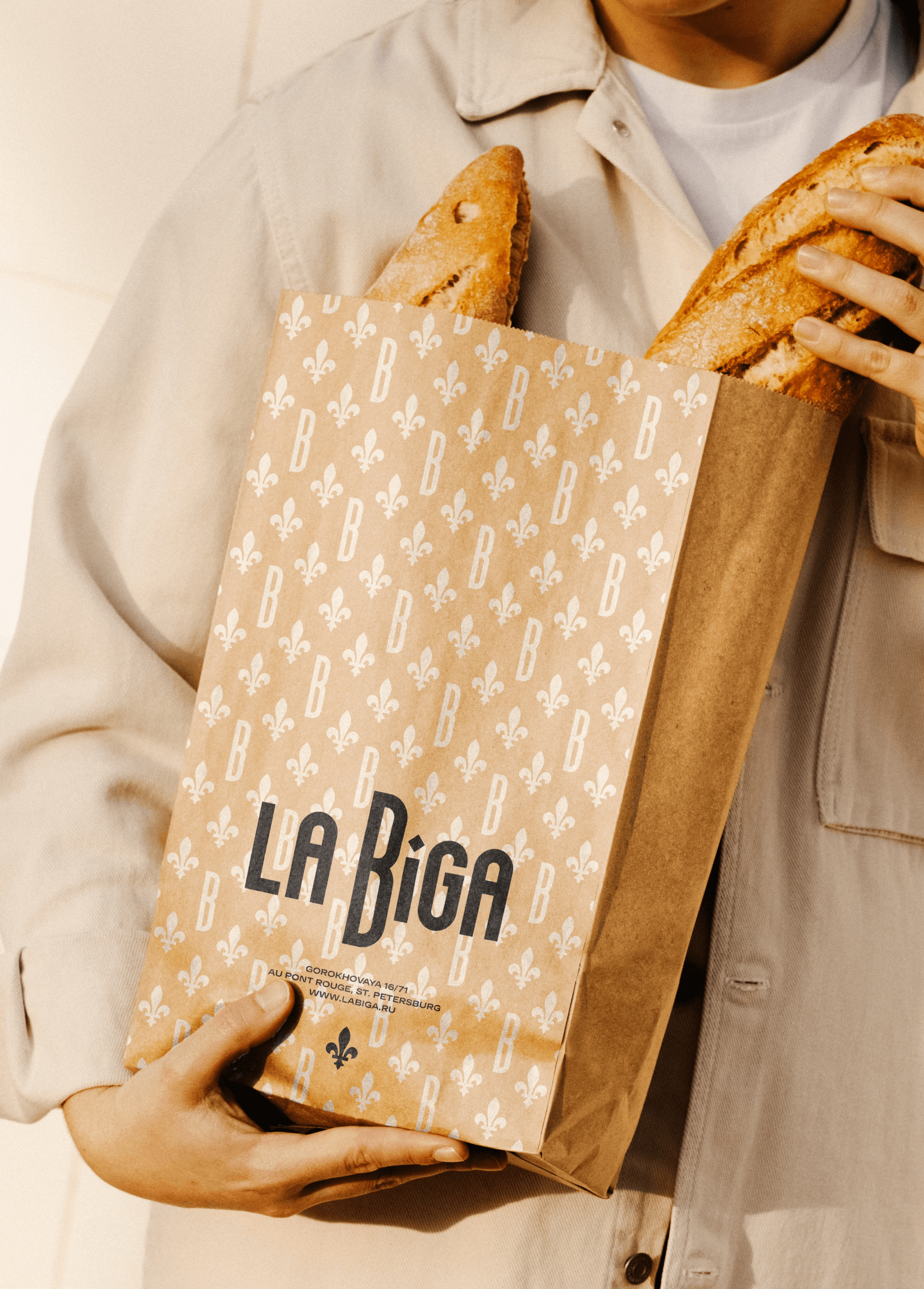 Streetside billboard with flyposters of the Batch.Works brand and illustrations