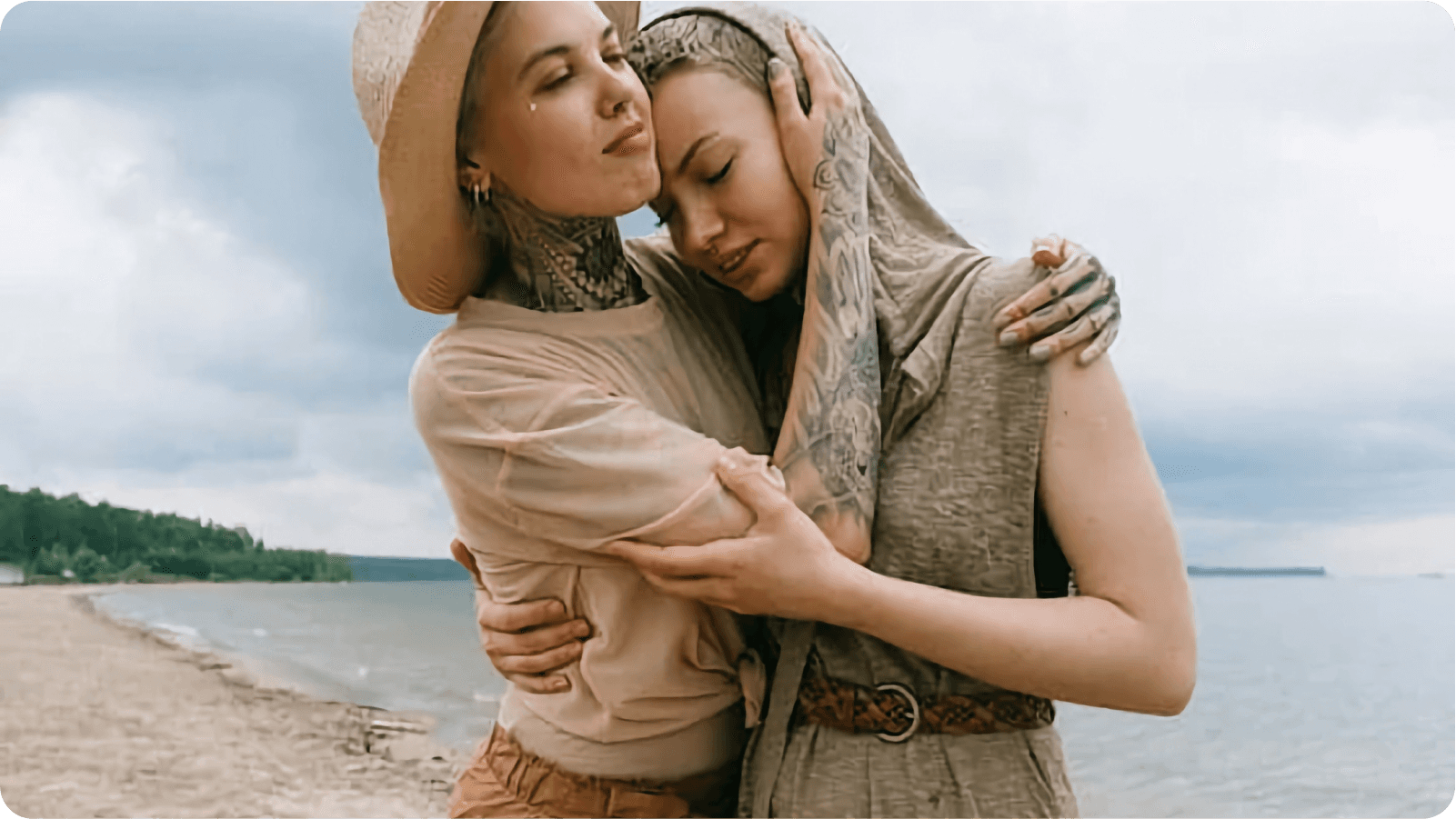 two women after the best online couples counselling LA offers embracing each other