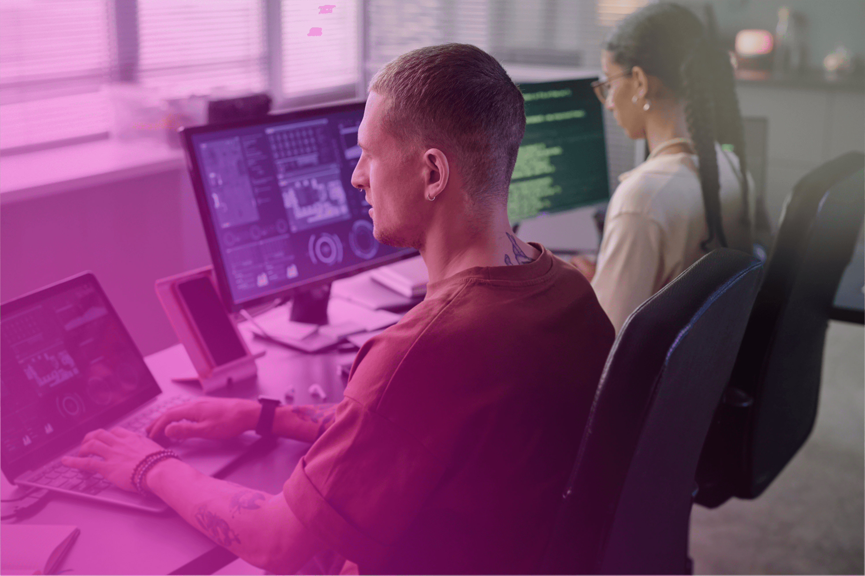 Image featuring a greyscaled website on an abstract background.