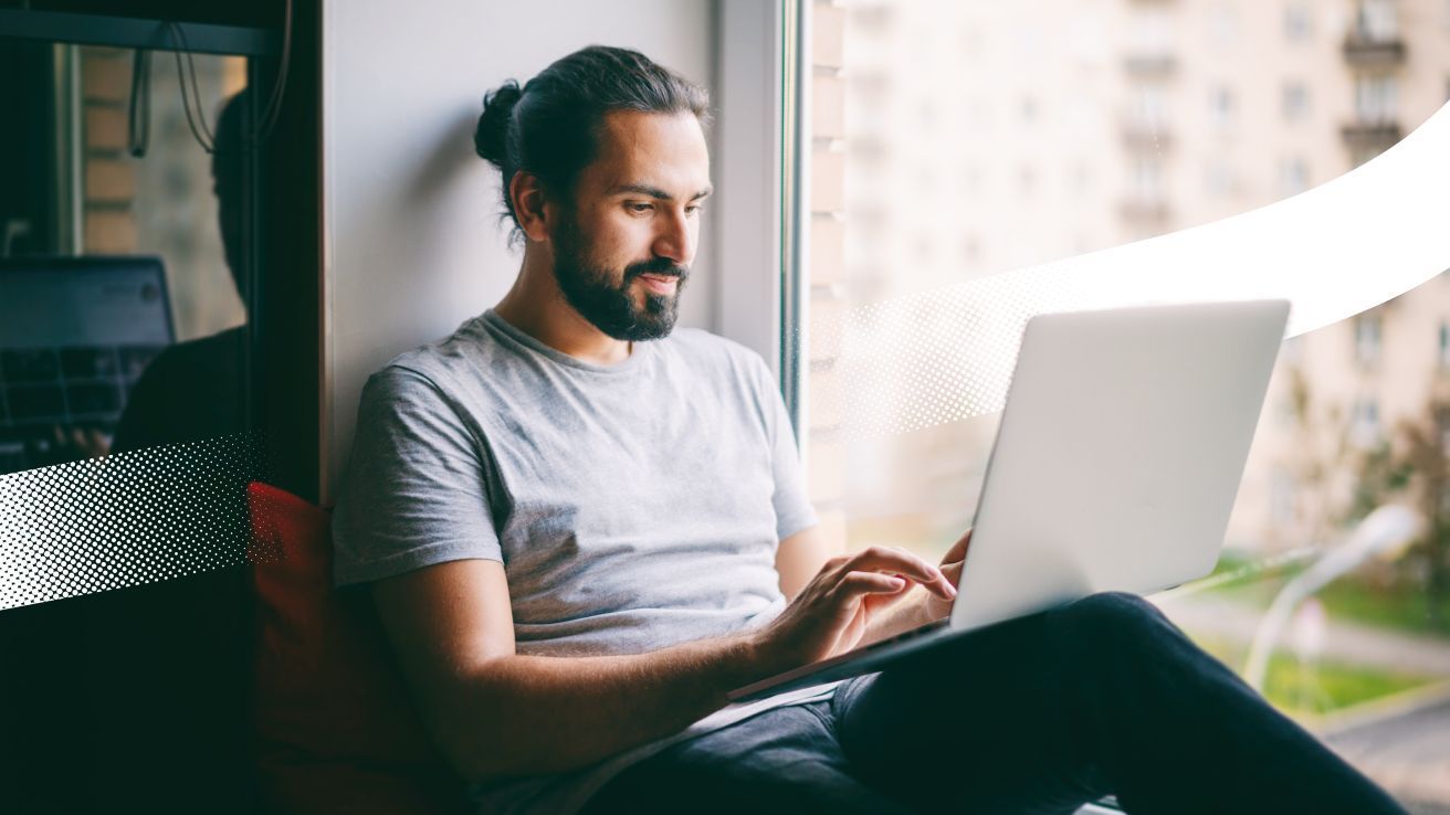 Illustration of a person studying French with an open book and a desk lamp, alongside the French flag and the word 'Français' in elegant script. The image represents French language learning and immersion.