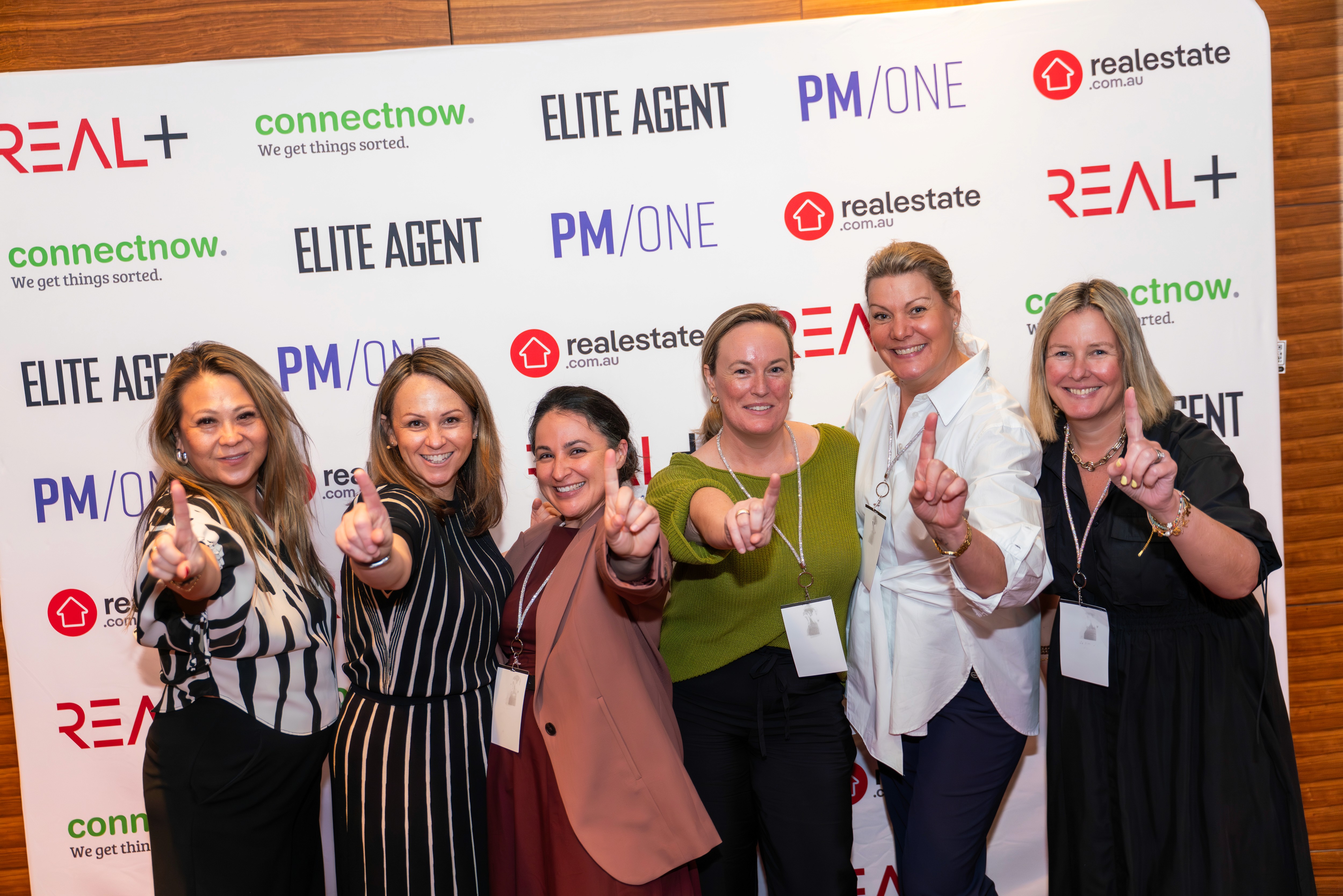 A guy holding mic with smile in his face