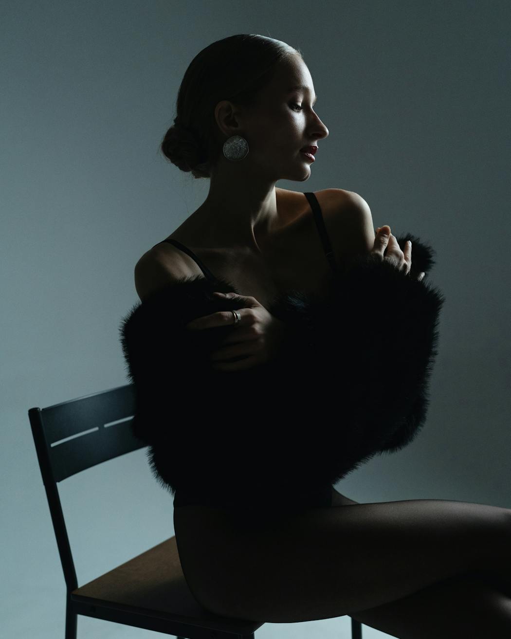 Elegant fashion portrait with moody lighting