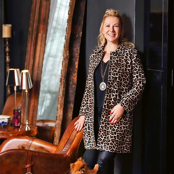 man in grey blazer near green trees during daytime