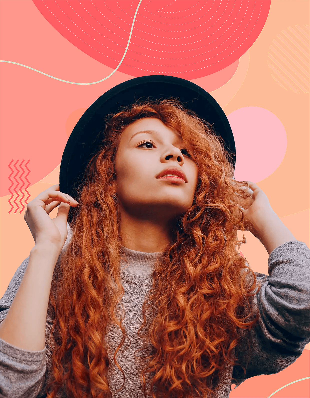 A woman with long, curly red hair wearing a black hat, gazing thoughtfully into the distance.