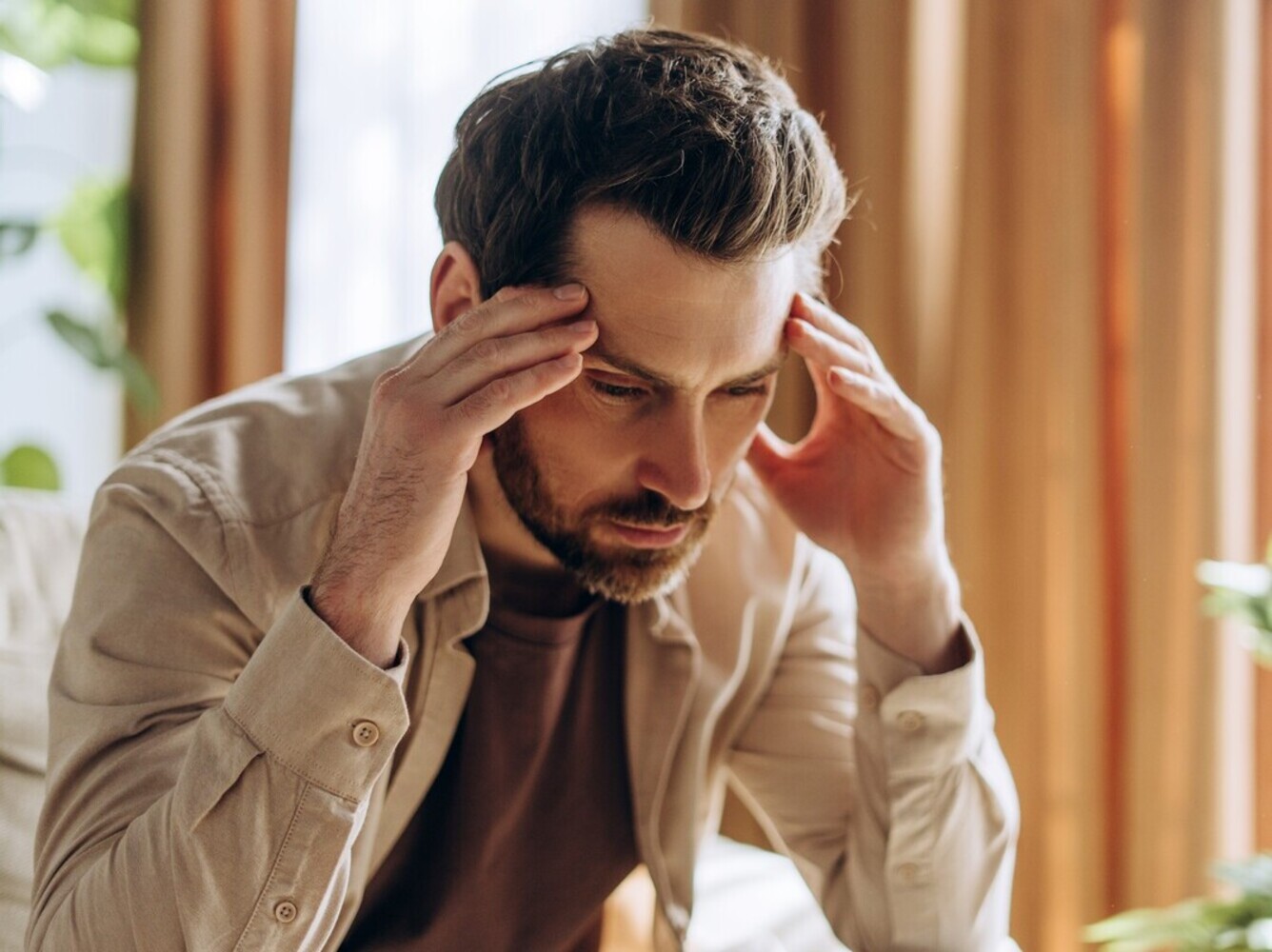 man struggling with fatigue because he needs to calculate steps to lose weight lower