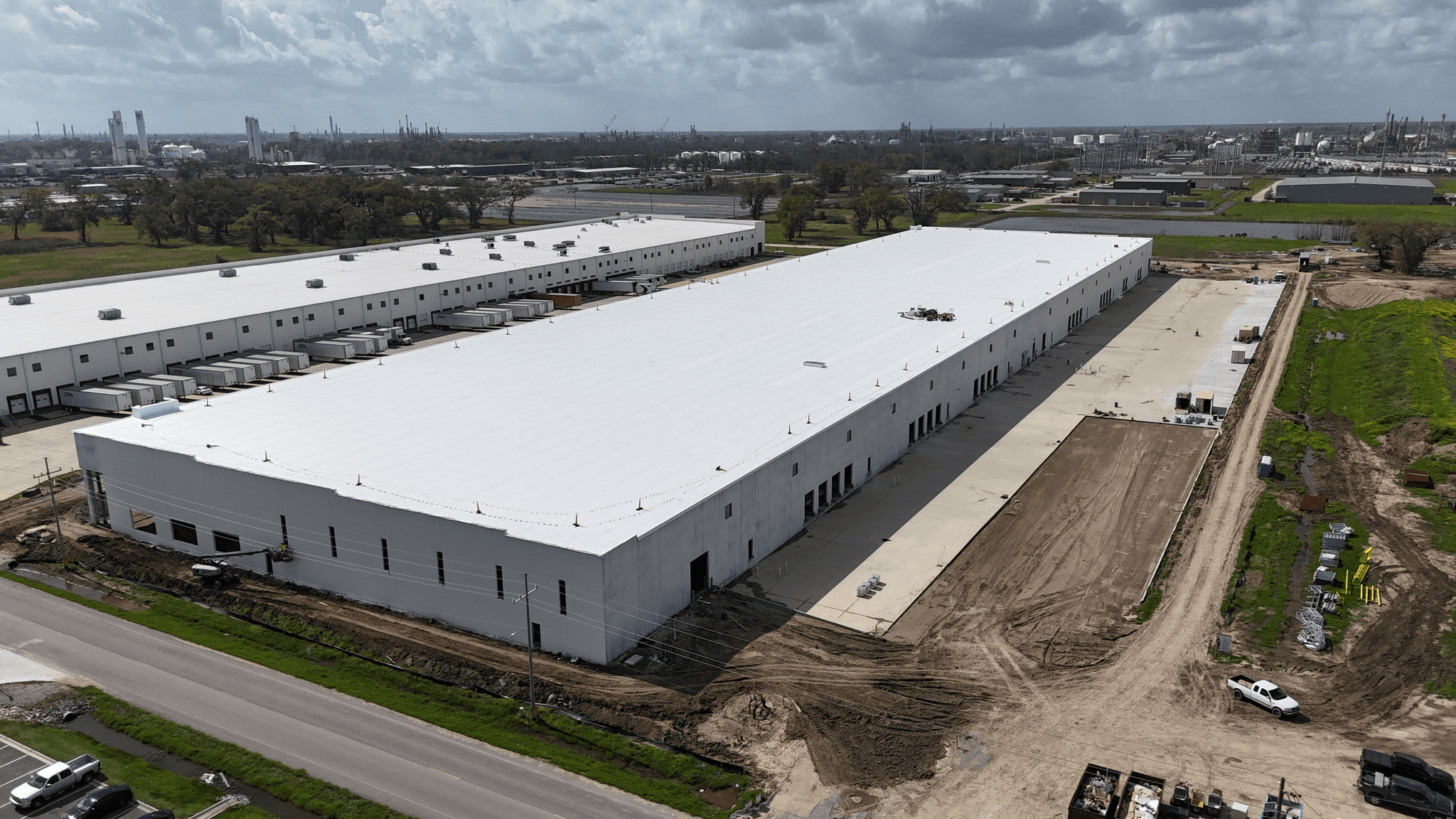 Elevated view of the Rivermark Phase II warehouse shell and truck court under construction.