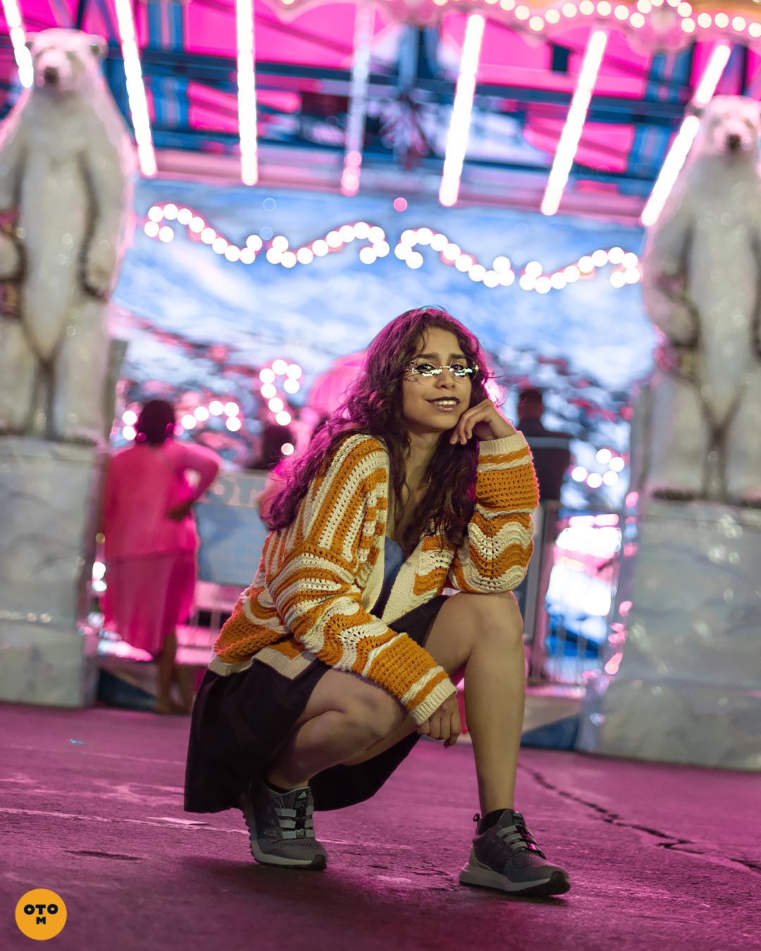 Colorful portrait photoshoot at carnival. Neon lights light up the night. @otrominuto