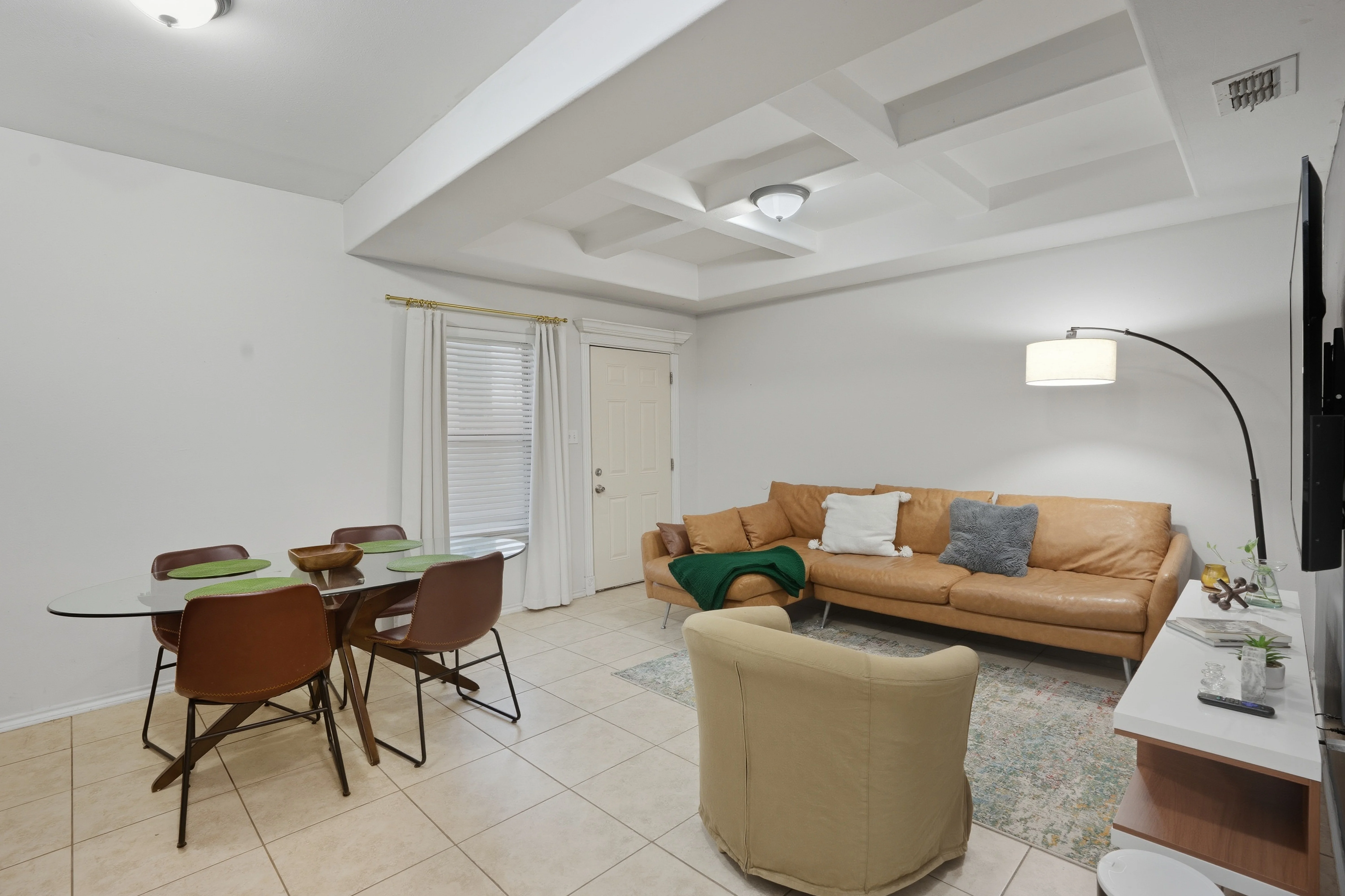 A picture of a house during twilight.